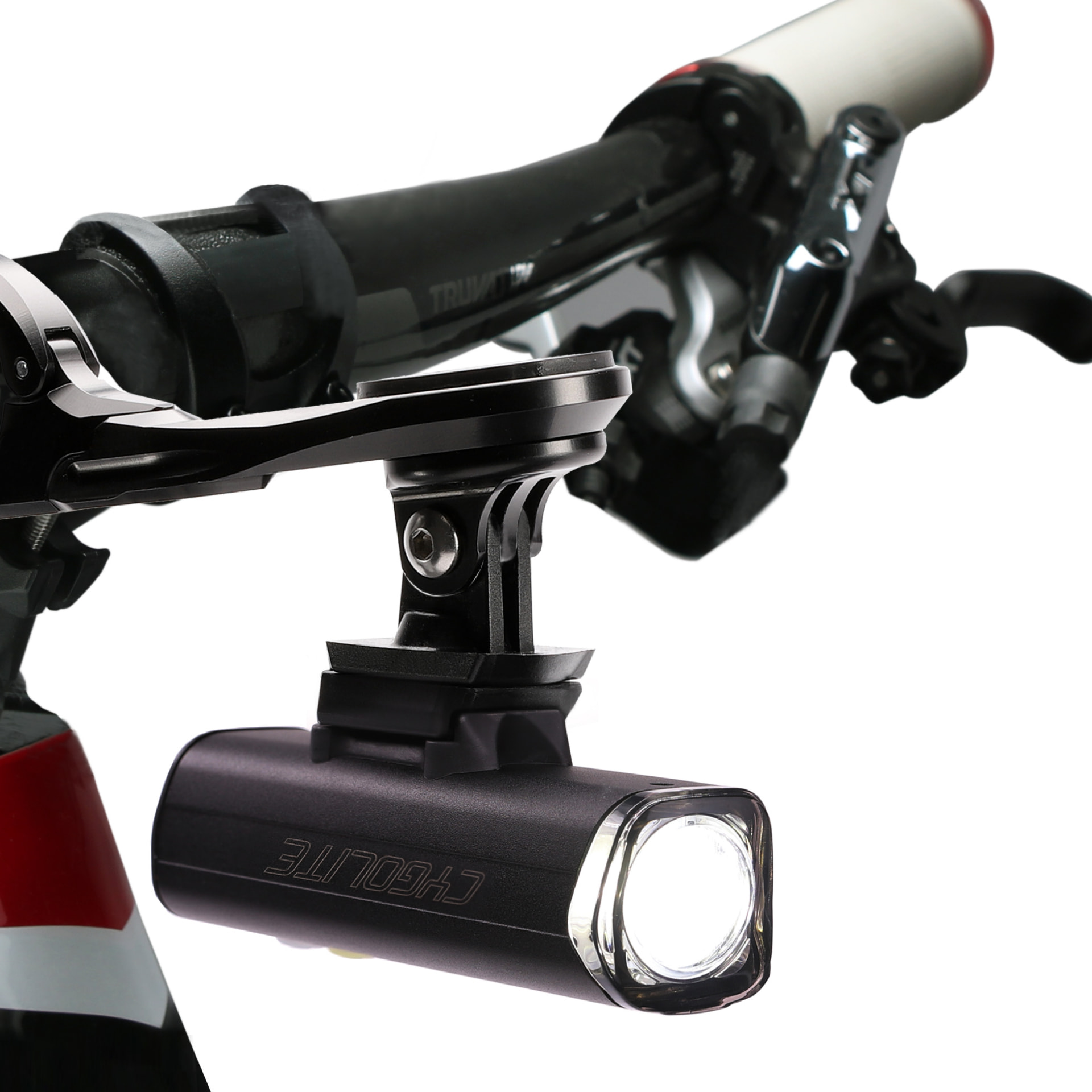 Cygolite headlight on a handlebar mount next to a separate mount bracket